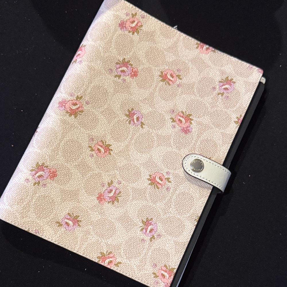 Coach flower and tan signature notebook